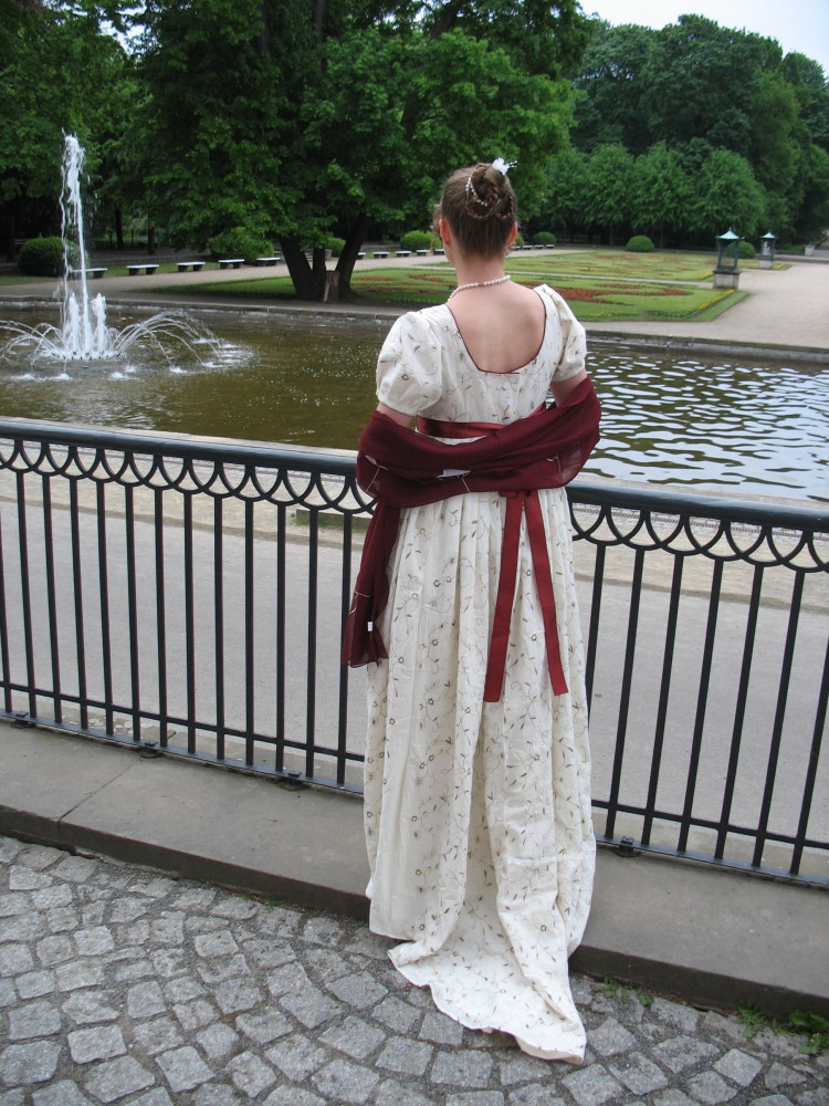 Empire dress, back view, cream and red