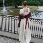 Empire dress, back view, cream and red